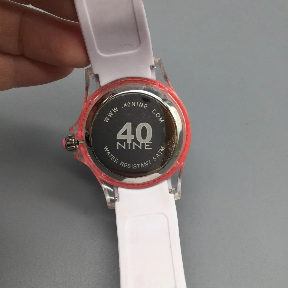 40nine Womens Watch 40mm Pink Case White Silicone Strap Date Quartz 50m